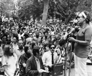 Photograph of JoAnn Evansgardner addressing a crowd.