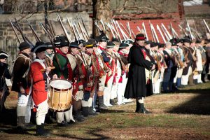 Reenactors at the Old Barracks Museum preparing to reenact the Battle of Trenton during Patriot's Week.