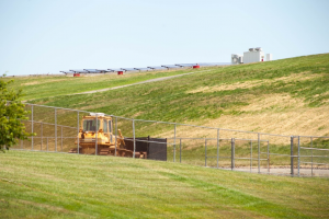 At the former Kinsley Landfill in Deptford, New Jersey, solar panels visible on the horizon are part of the solar energy farm created by the Public Service Energy and Gas Company (PSE&G) in 2015. (Photograph by Chase Epstein for The Encyclopedia of Greater Philadelphia).